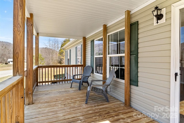 wooden terrace with covered porch