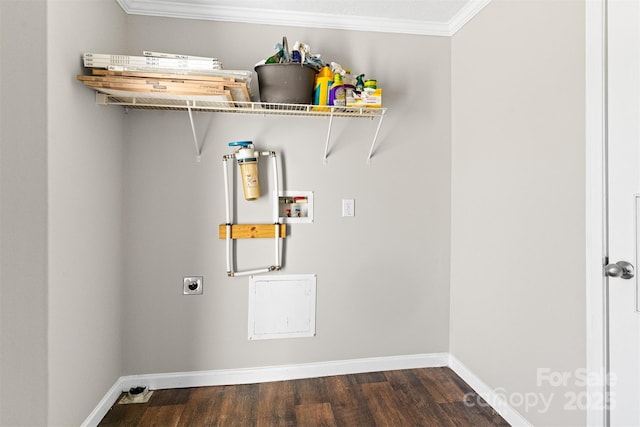 washroom featuring hookup for a washing machine, crown molding, electric dryer hookup, and dark hardwood / wood-style floors