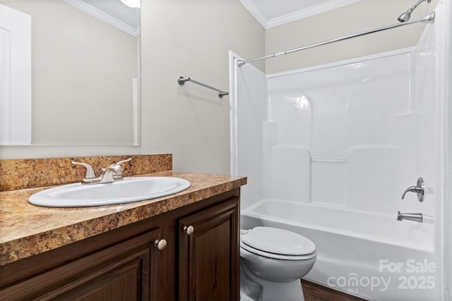 full bathroom with toilet, ornamental molding, bathtub / shower combination, and vanity