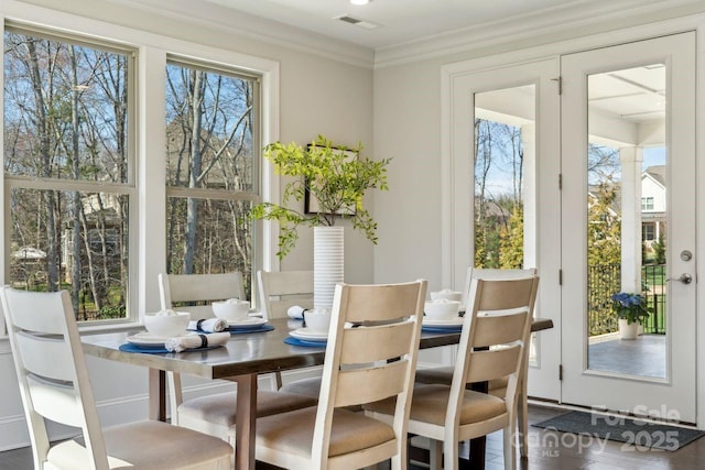 sunroom featuring visible vents