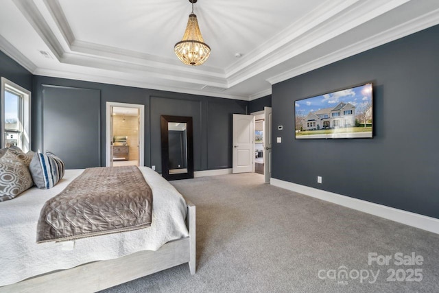 bedroom featuring baseboards, an inviting chandelier, carpet, a tray ceiling, and crown molding