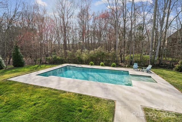 view of pool featuring a fenced in pool, a patio area, a fenced backyard, and a yard