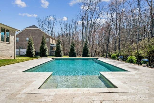 pool featuring a patio