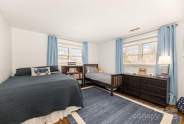 bedroom featuring dark hardwood / wood-style floors