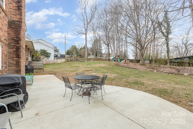 view of patio featuring a playground