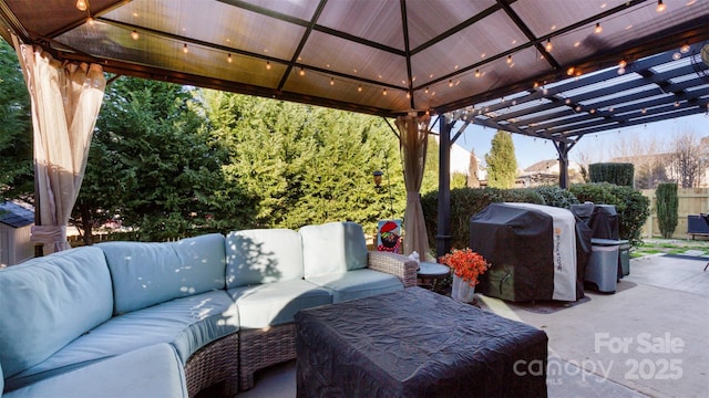 view of patio featuring a gazebo, a pergola, an outdoor hangout area, and grilling area