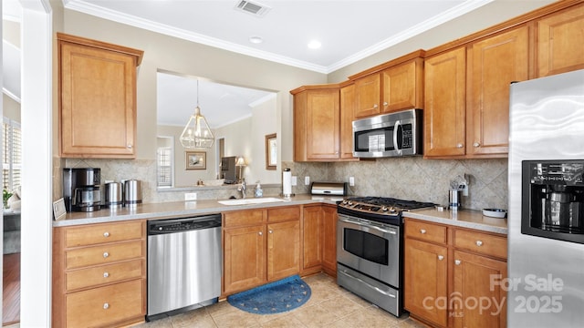 kitchen with light tile patterned floors, visible vents, appliances with stainless steel finishes, light countertops, and a sink