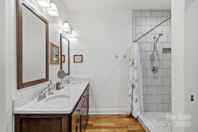 bathroom with vanity, hardwood / wood-style floors, and a shower with shower curtain