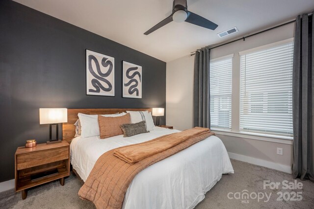 2306 Elizabeth Mill Pl, Charlotte, NC 28208 - bedroom featuring baseboards, visible vents, carpet floors, and a ceiling fan