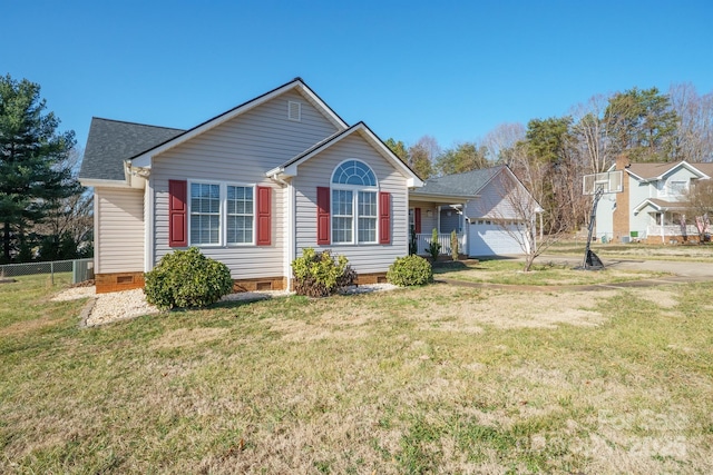 view of front of property featuring a garage and a front lawn