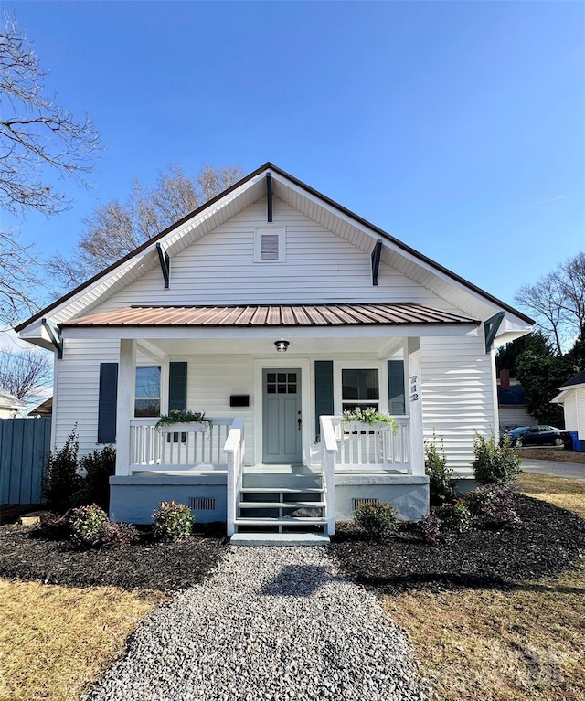 view of front of property featuring covered porch