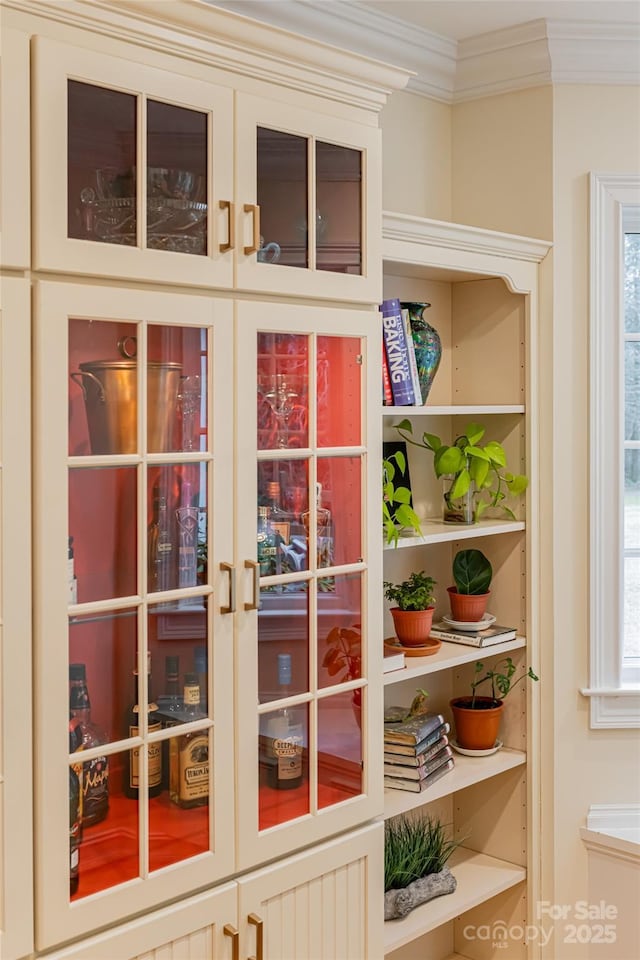 doorway to outside with crown molding