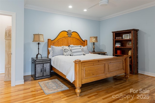 bedroom featuring crown molding, ceiling fan, and wood-type flooring