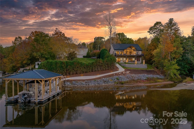 view of dock with a water view