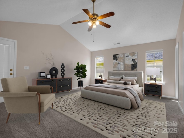 carpeted bedroom with lofted ceiling, multiple windows, a ceiling fan, and baseboards