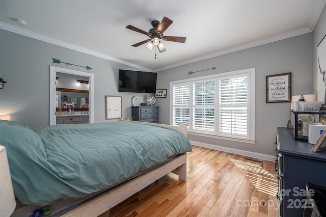 bedroom featuring a ceiling fan, light wood-type flooring, baseboards, and ornamental molding