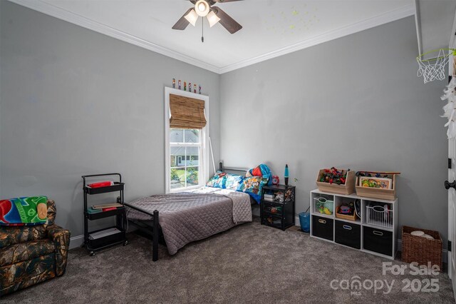 carpeted bedroom featuring ceiling fan and ornamental molding