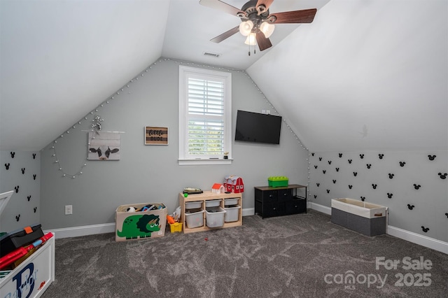 rec room with visible vents, baseboards, carpet flooring, and vaulted ceiling