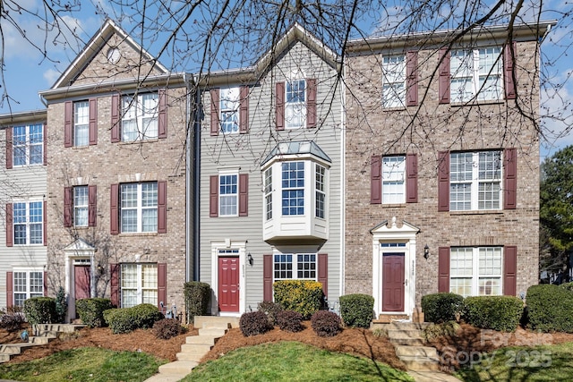 multi unit property featuring brick siding