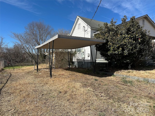 view of yard with a carport