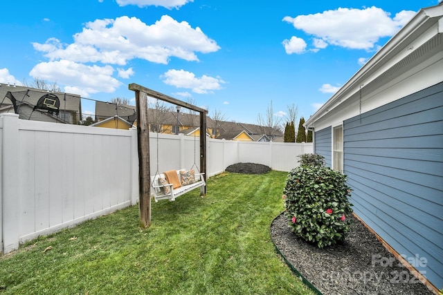 view of yard with a fenced backyard