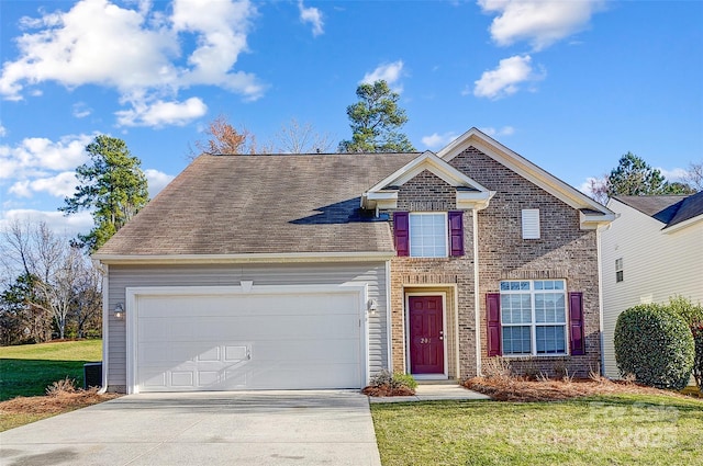 traditional-style house featuring concrete driveway, a front lawn, an attached garage, and brick siding