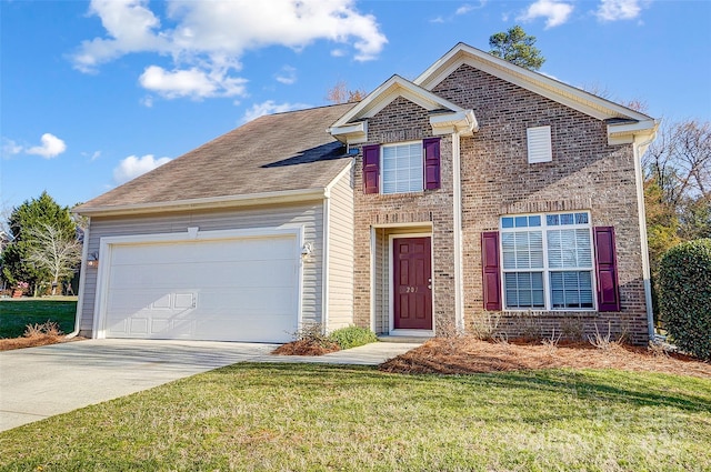 traditional home with driveway, a front lawn, an attached garage, and brick siding