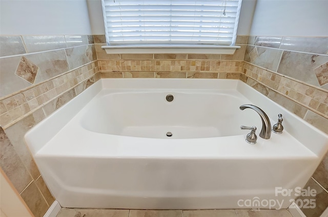 bathroom featuring a garden tub