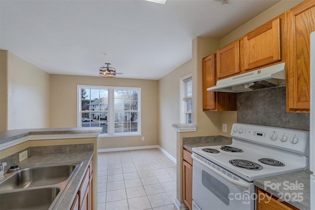 kitchen with sink, light tile patterned flooring, and white range with electric stovetop