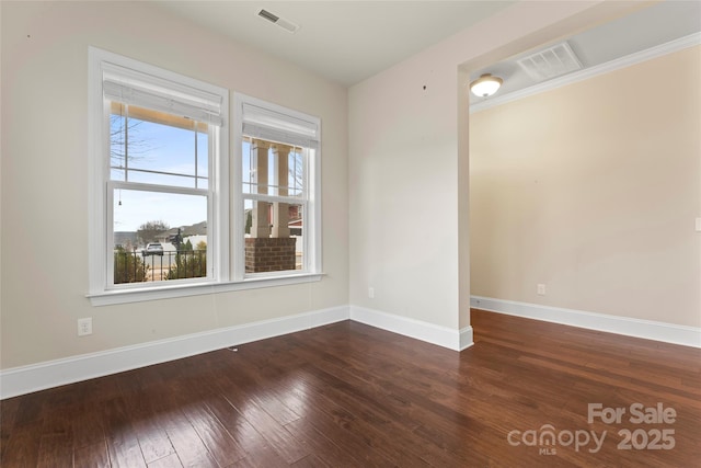 unfurnished room featuring dark wood-type flooring