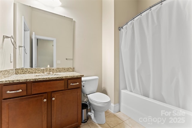 full bathroom featuring tile patterned flooring, vanity, shower / tub combo with curtain, and toilet