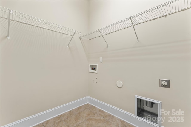 clothes washing area featuring gas dryer hookup, hookup for a washing machine, and hookup for an electric dryer