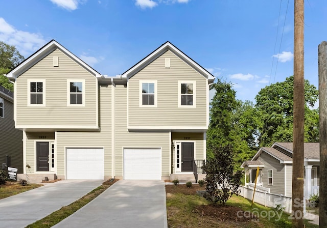 2825 New Pineola Rd Unit 7A, Charlotte, NC 28208 - view of front of home with an attached garage, driveway, and fence