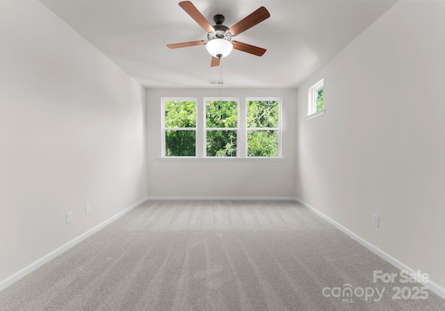 2825 New Pineola Rd Unit 7A, Charlotte, NC 28208 - spare room with a ceiling fan, baseboards, and carpet floors