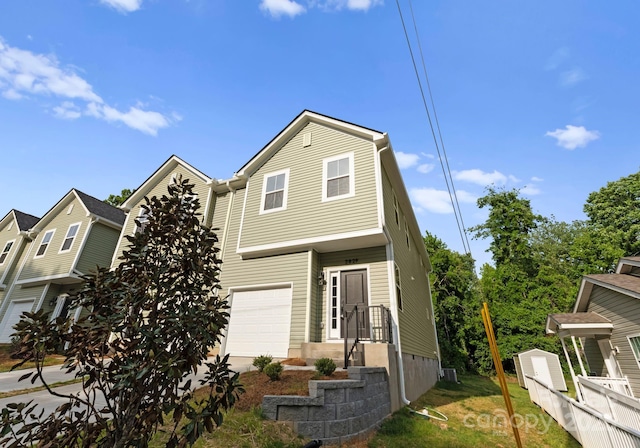 2825 New Pineola Rd Unit 7A, Charlotte, NC 28208 - view of front of home featuring fence and a garage