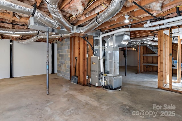 basement featuring heating unit