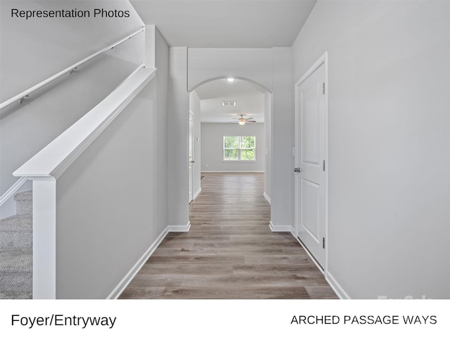 hall with light hardwood / wood-style floors