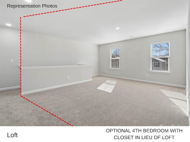 unfurnished room featuring light colored carpet