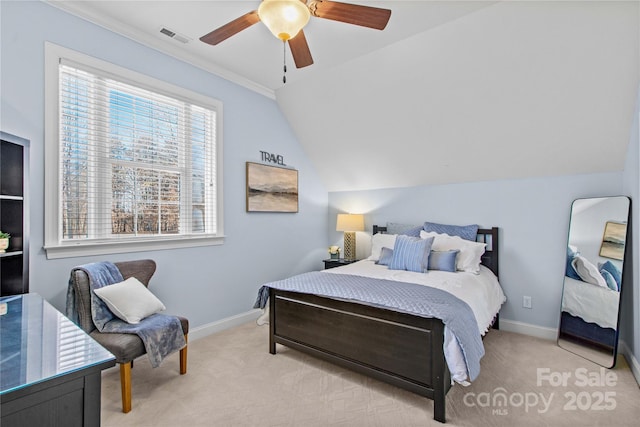 bedroom with visible vents, a ceiling fan, light carpet, vaulted ceiling, and baseboards