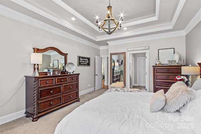 bedroom featuring a tray ceiling, a notable chandelier, ornamental molding, light carpet, and baseboards