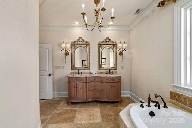 2725 Windsor Rd, Winston Salem, NC 27104 - bathroom with a chandelier, stone tile floors, baseboards, a bath, and double vanity