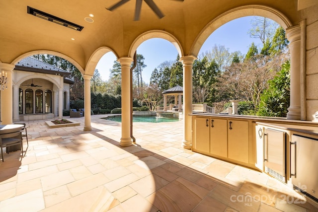 2725 Windsor Rd, Winston Salem, NC 27104 - view of patio featuring a ceiling fan, a gazebo, and an outdoor pool