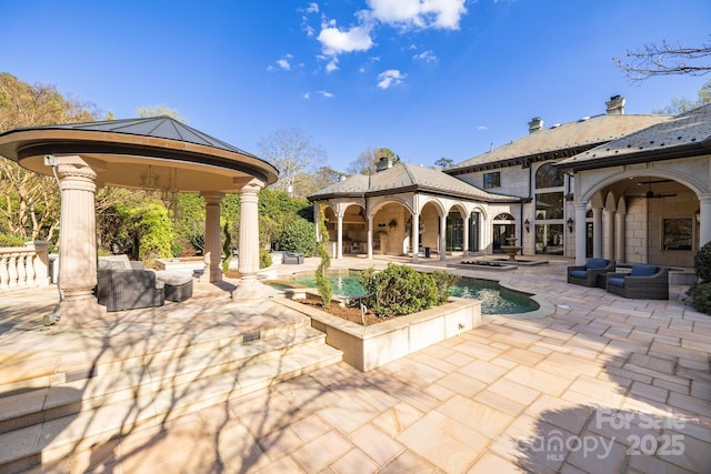 2725 Windsor Rd, Winston Salem, NC 27104 - view of patio with a gazebo, an outdoor hangout area, and an outdoor pool