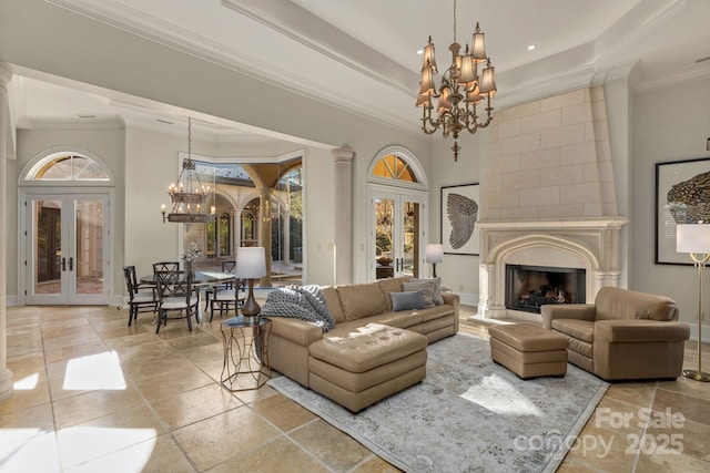 2725 Windsor Rd, Winston Salem, NC 27104 - living room with a chandelier, french doors, a towering ceiling, a tray ceiling, and a fireplace with raised hearth