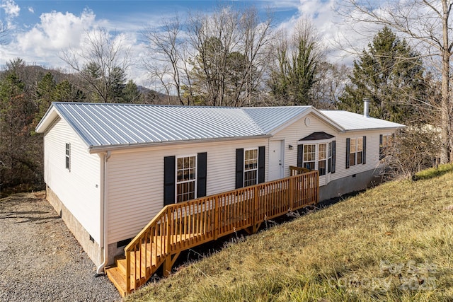 view of front of house with a deck