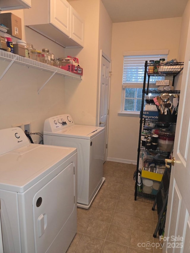 laundry area featuring tile patterned flooring and independent washer and dryer