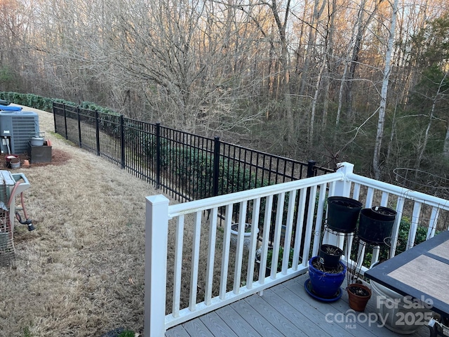 wooden deck featuring central AC