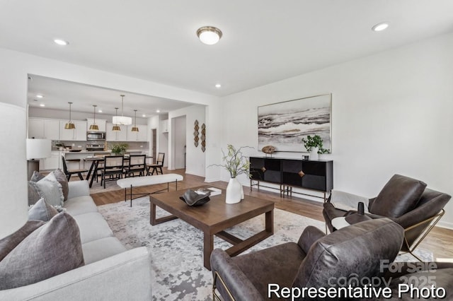 living room with light hardwood / wood-style floors