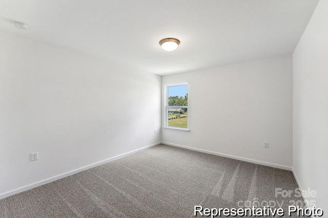 unfurnished room featuring carpet flooring