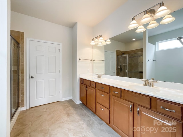 bathroom featuring vanity, an enclosed shower, and tile patterned floors